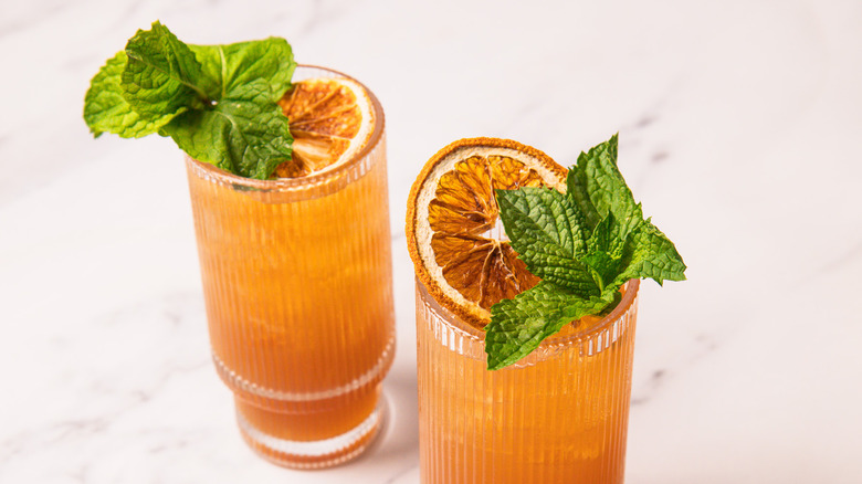 Two glasses of sweet tea whiskey smash
