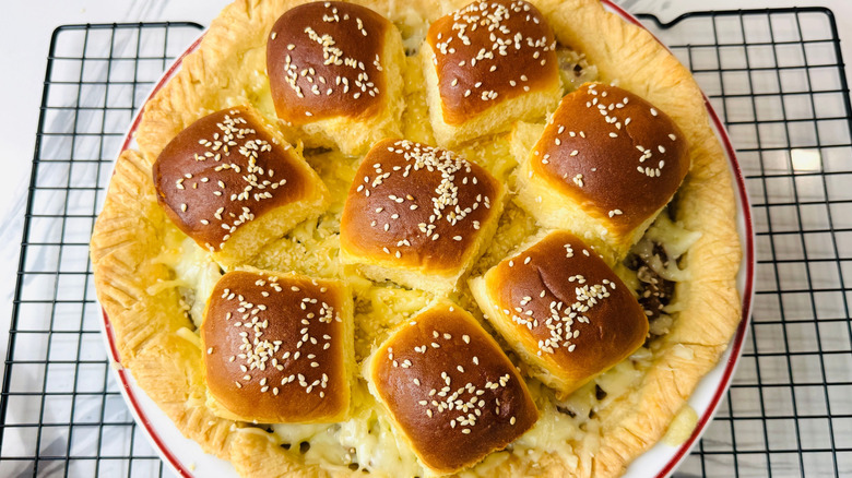 Cheeseburger pie with sesame seed slider bun topping