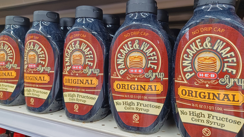 Bottles of pancake syrup with the label 