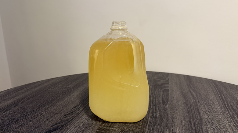 Yellow and orange gallon of flavored margarita