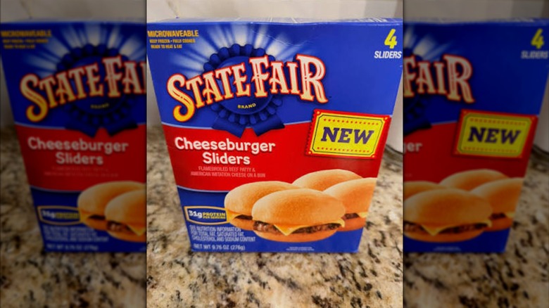 A box of State Fair brand cheeseburger sliders sitting on a kitchen countertop