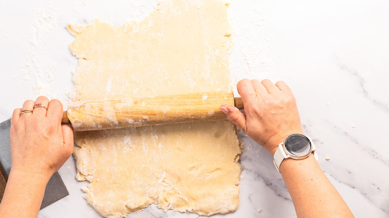 Rolling shortbread cookies with rolling pin
