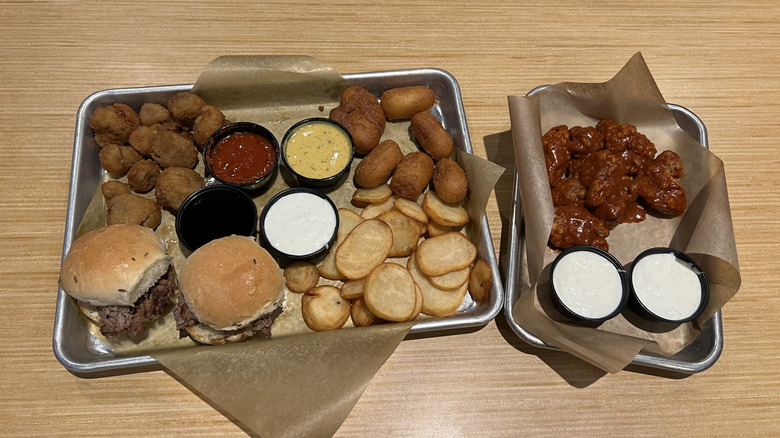 Buffalo Wild Wings Throwback menu foods on trays.