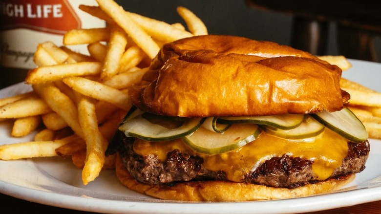 Burger with fries and a drink