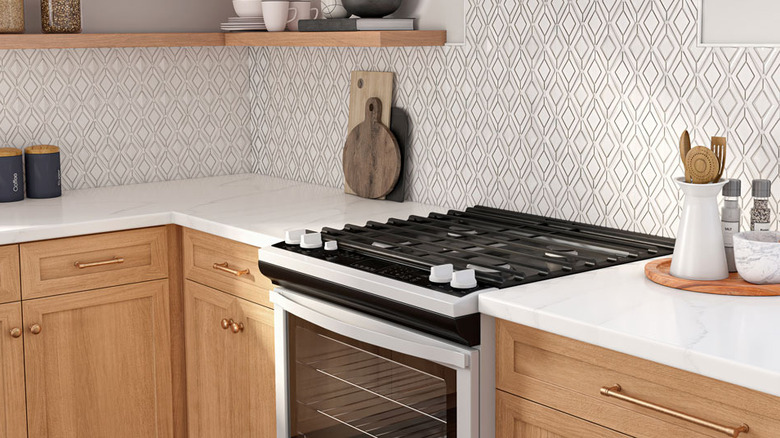 A Wilsonart solid surface countertop in a white and gray marbled pattern