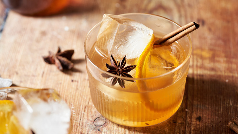 Spiced chai old fashioned cocktail with star anise and a cinnamon stick