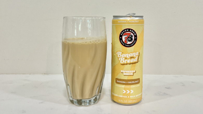7 Brew canned Banana Bread Espresso Breve drink in a glass.