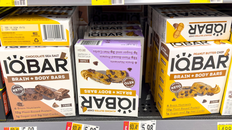 Boxes of IQBar protein bars on a grocery store shelf