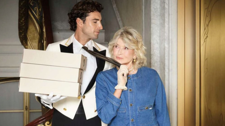 Martha Stewart posing with a man for the MOTHER collaboration