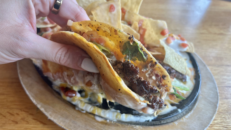 Close up of Applebee's O-M-Cheese-adilla burger.