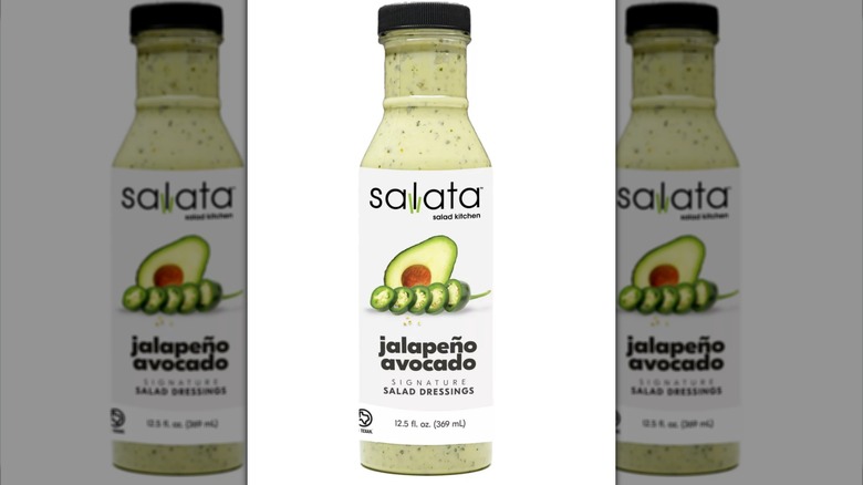 Bottle of Salata Jalapeño Avocado dressing on white background