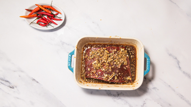 Marinating steak in mix.