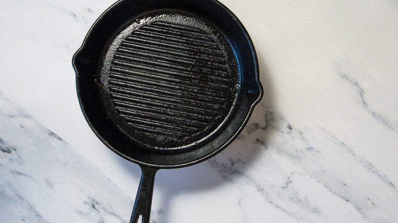 Preheating cast iron pan