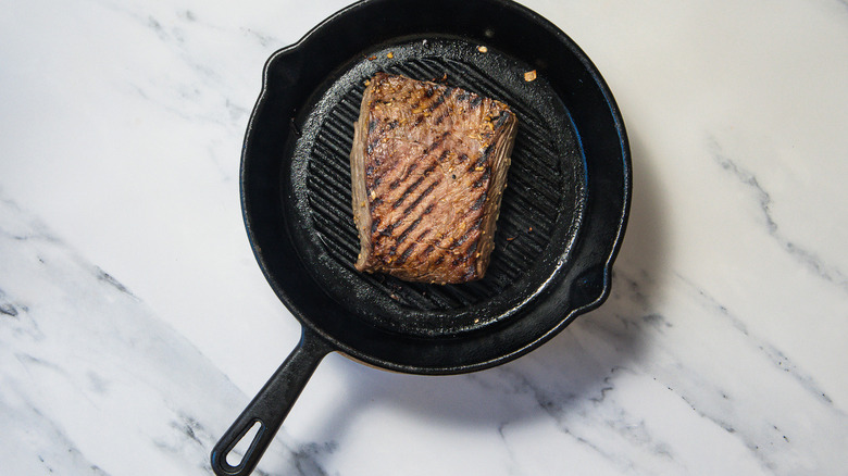 Grilled steak in grill pan