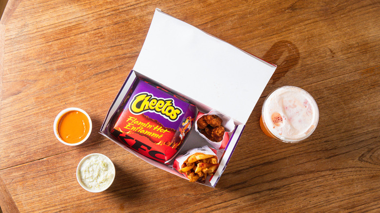 Overhead view of the Flamin' Hot Chicken Sandwich Box Meal on a table