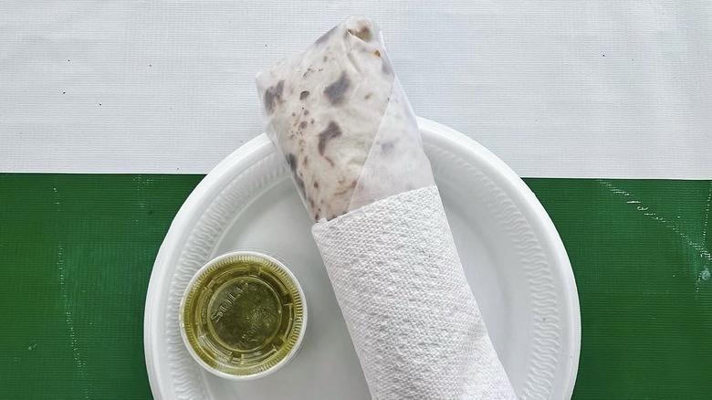 Burrito with green salsa