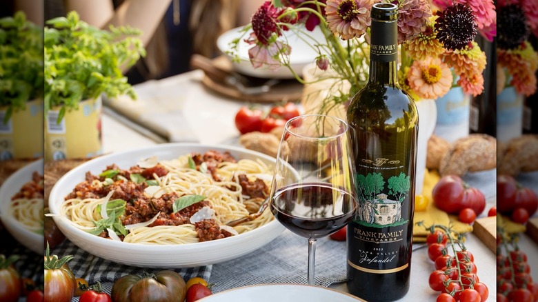 Bottle of Frank Family Vineyards Zinfandel with pasta and red sauce