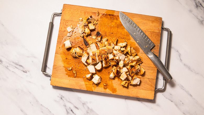 Diced chicken on board
