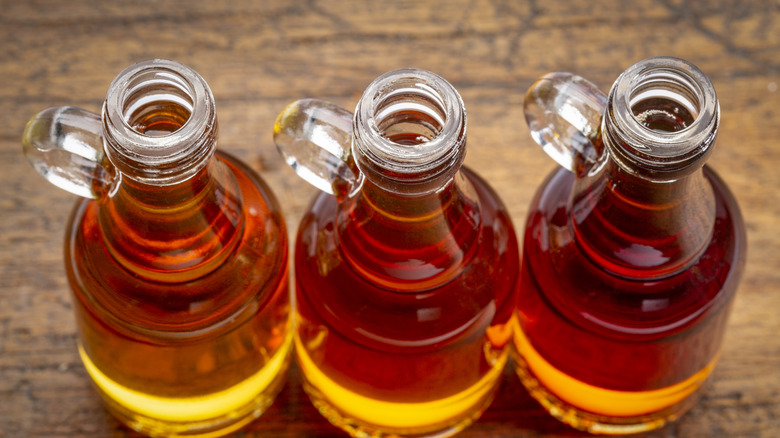 Three bottles of maple syrup