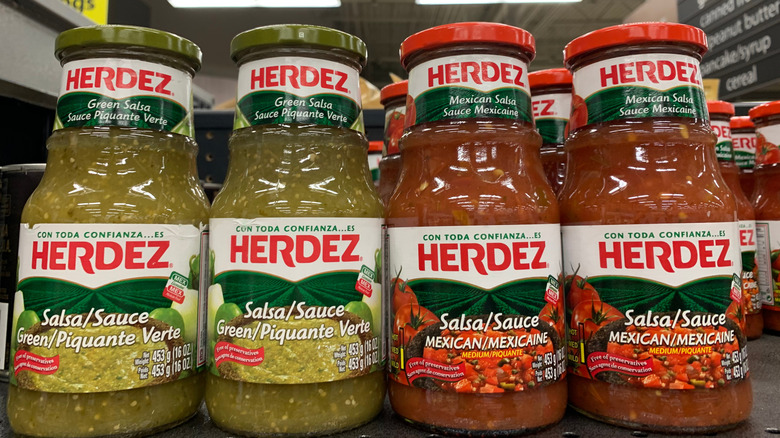 Two bottles of Herdez Salsa Verde and Salsa Casera