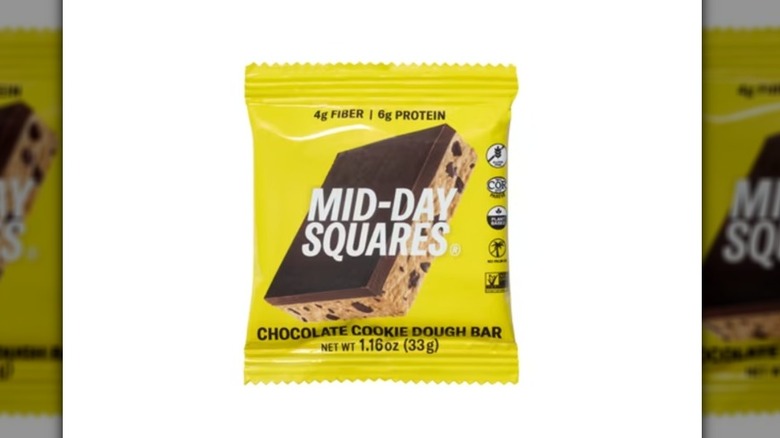 a bag of Mid-Day Squares Functional Chocolate, Cookie Dough Flavor against a white background