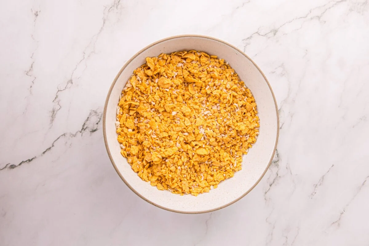 Crushed cornflake and panko coating in a bowl, ready for breading the chicken