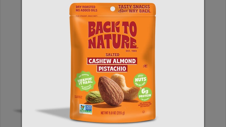 Back of Back to Nature trail mix with images of almond, cashew, and pistachio on front