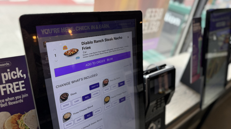 Taco Bell kiosk displaying Diablo Ranch Steak Nacho Fries