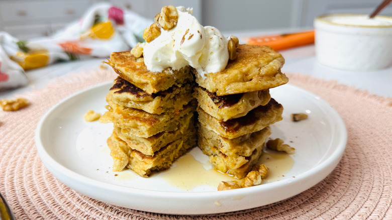 Stack of carrot cake pancakes with small section removed