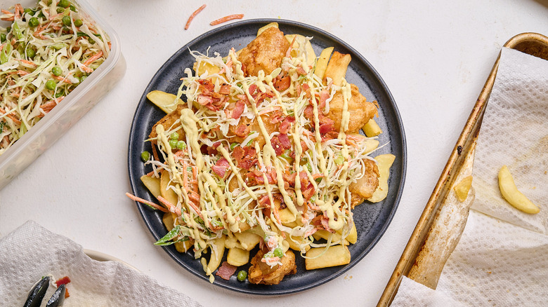 french fries topped with coleslaw and curry ranch