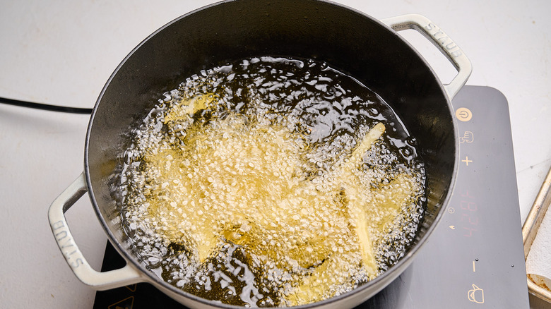 frying french fries in hot oil