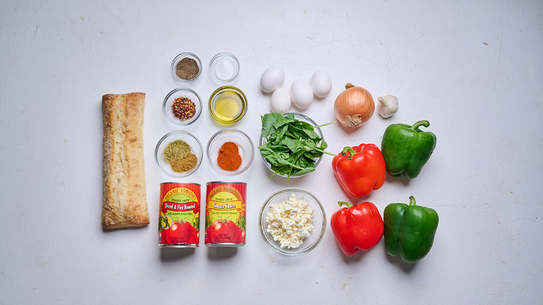 Shakshuka stuffed pepper ingredients on a table