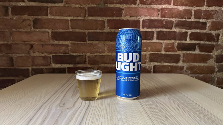 Bud Light beer in small glass on table