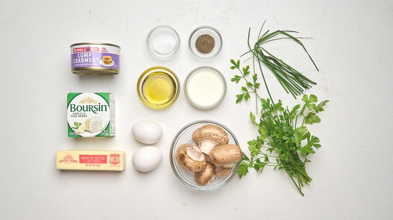 Crab and cremini omelet ingredients on a table