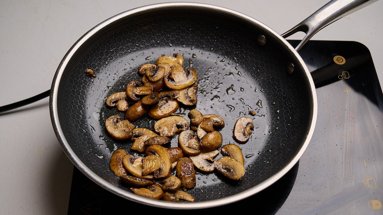 cooked mushrooms in a skillet