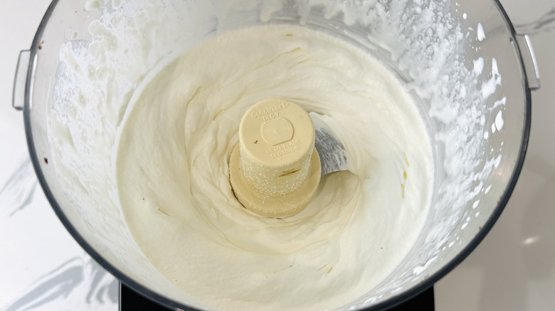 Lightly whipped cream in food processor