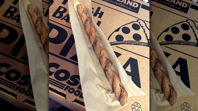 Costco's cinnamon sugar Twisted Churro on top of a pizza box