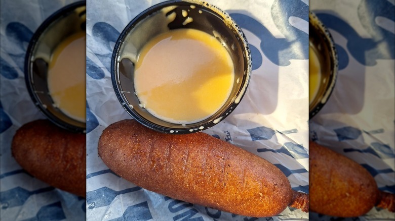 Culver's Corn Dog beside cheese sauce on wrapper