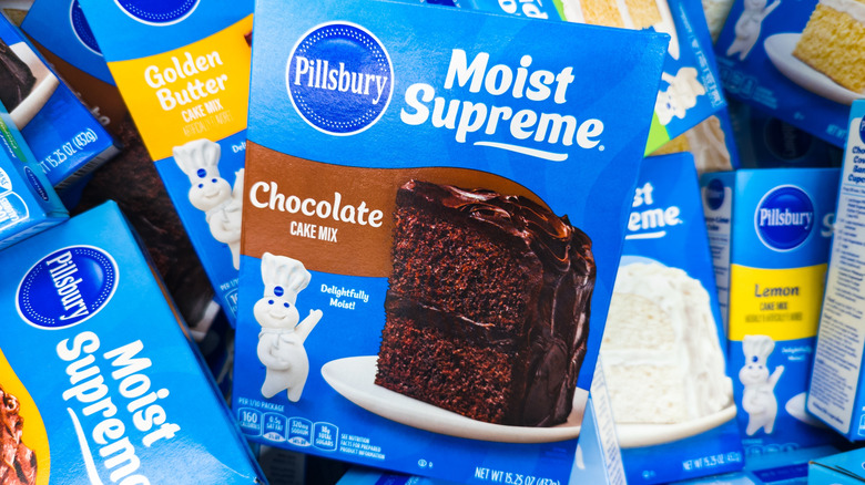 Various boxes of Pillsbury cake mixes on display with the Chocolate Cake Mix front and center