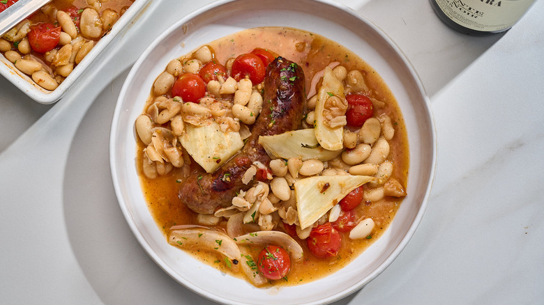 sausage and beans in a bowl on a table