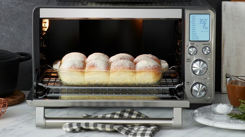 Breville toaster oven filled with buns