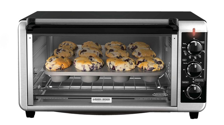 Black+Decker toaster oven filled with muffins
