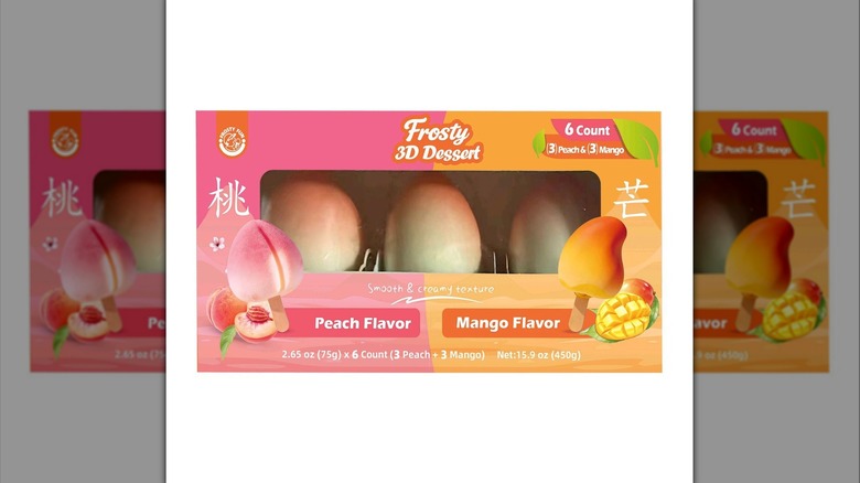 Frosty Peach and Mango Fruit Shaped Ice Cream bars inside box with split pink and orange design on a white background.