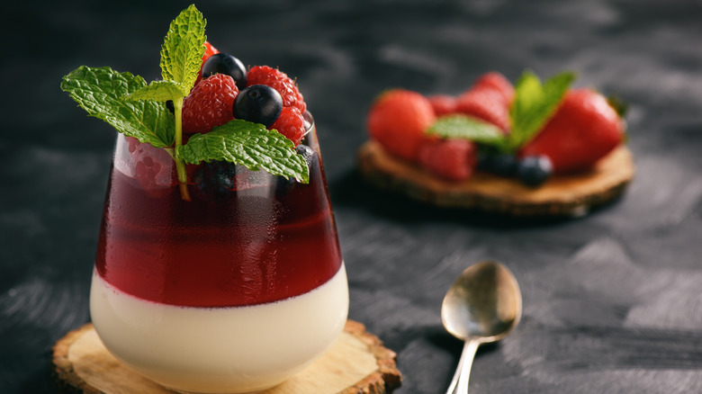 A layered Jell-O dessert in a cup