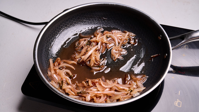 cooking vinegar and sugar in a skillet