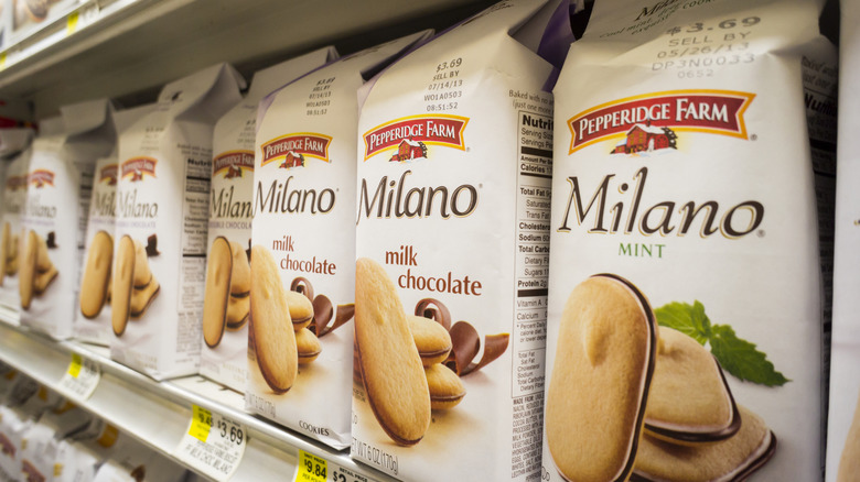 Bags of Pepperidge Farm Milano cookies line a grocery store shelf.