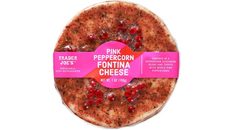 Wheel of Trader Joe's Pink Peppercorn Fontina Cheese on white background