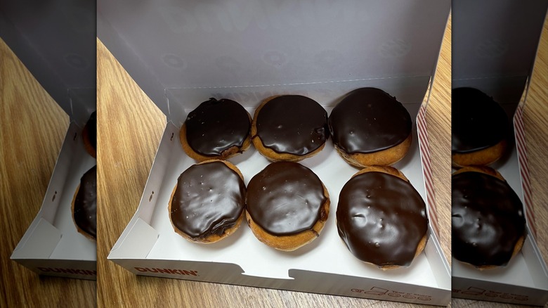 Open Dunkin' box filled with six Boston Kreme donuts