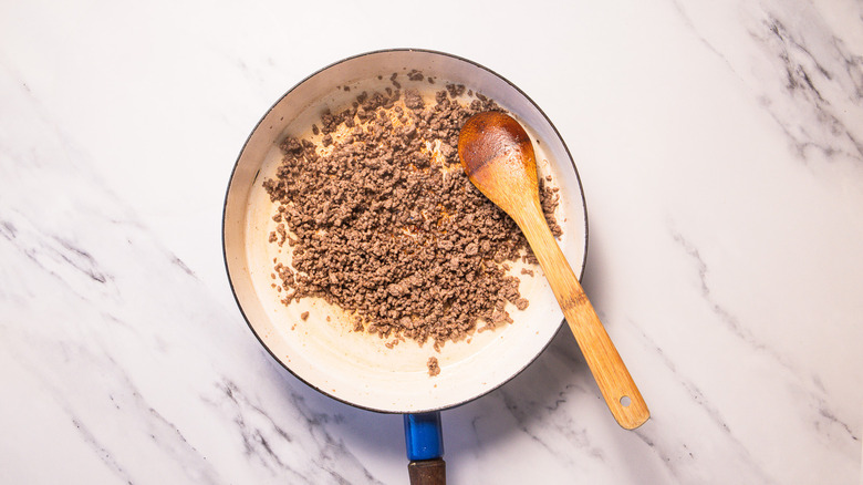 Browned ground beef on pan
