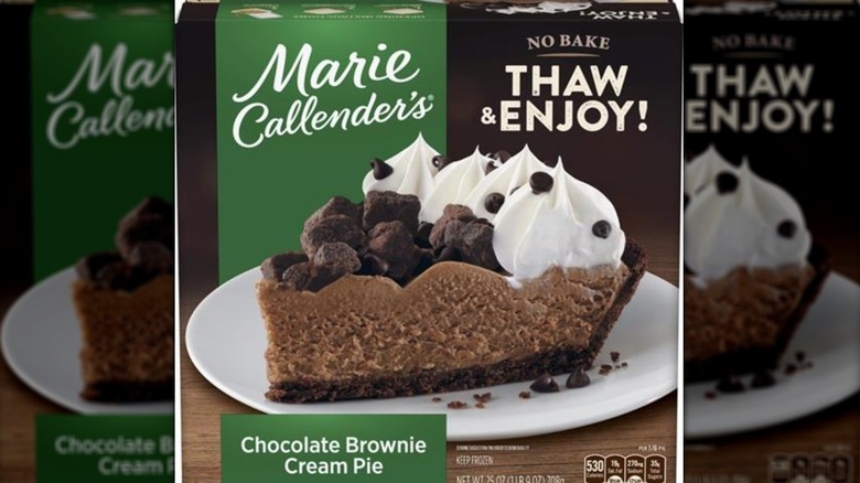 Box of Marie Callender's Chocolate Brownie Cream Pie, featuring a slice of chocolate cake topped with brownie pieces and whipped cream